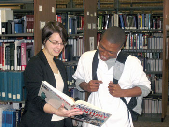 Librarian Kiffany Francis helps a student